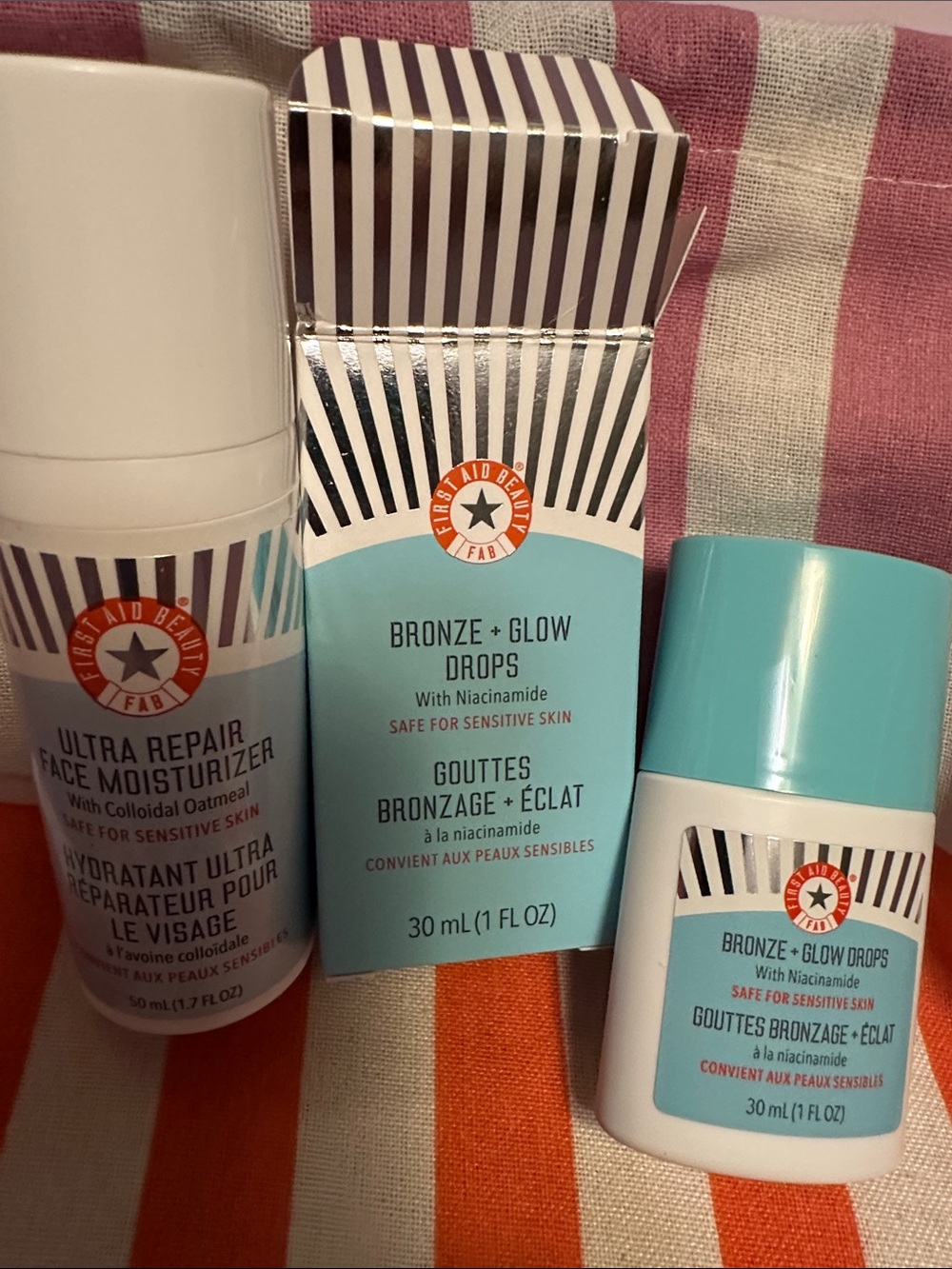 New First aid beauty fab face moisturizer and bronze glow drops.